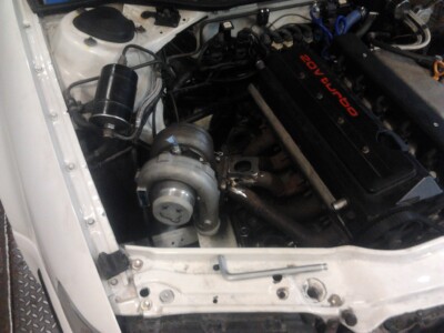 Fitting bigger turbo to exhaust manifold Audi S4 1992 enginebay